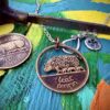 Hand cut coin jewellery - Irish half penny sow and piglets recycled