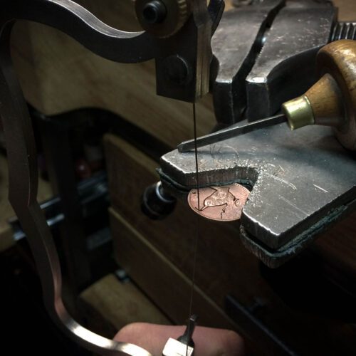 Hand cut, carved and engraved Jenny Wren Farthing coin pendant necklace made in the Hg workshop