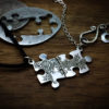 Handmade and upcycled jigsaw pieces necklace silver coin