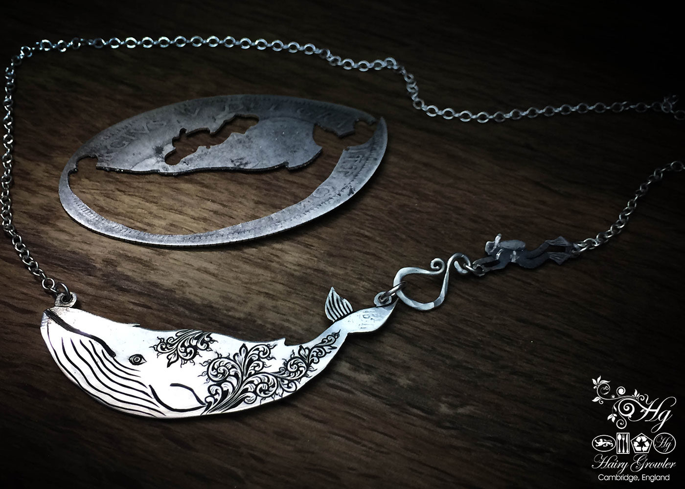 Handcrafted and recycled sterling silver half crown coin leviathan whale necklace