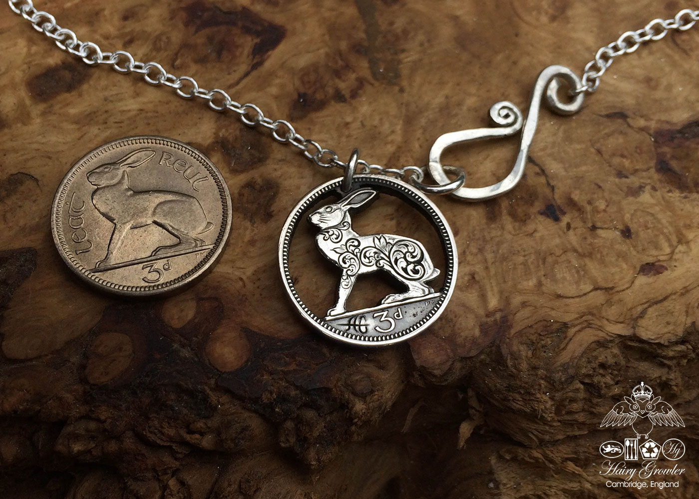 Hand-cut and carved Irish hare threepence coin pendant