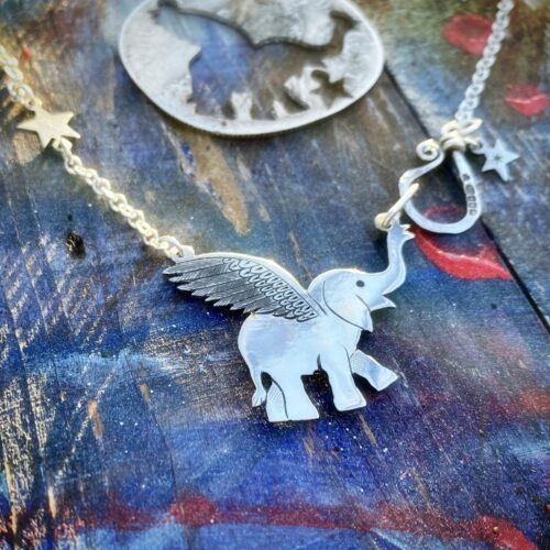 Handcrafted and recycled sterling silver flying-elephant necklace