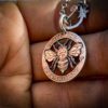 Handcrafted and upcycled silver shilling The Silver Shilling collection. silver Bee necklace totally handcrafted and recycled from old sterling silver shilling coins. Designed and created by Hairy Growler Jewellery, Cambridge, UK. necklace
