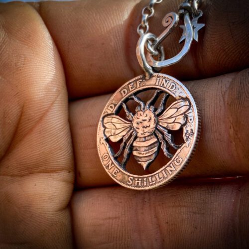 Handcrafted and upcycled silver shilling The Silver Shilling collection. silver Bee necklace totally handcrafted and recycled from old sterling silver shilling coins. Designed and created by Hairy Growler Jewellery, Cambridge, UK. necklace
