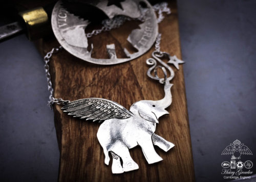 Handcrafted and recycled sterling silver flying-elephant necklace