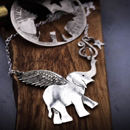 Handcrafted and recycled sterling silver flying-elephant necklace