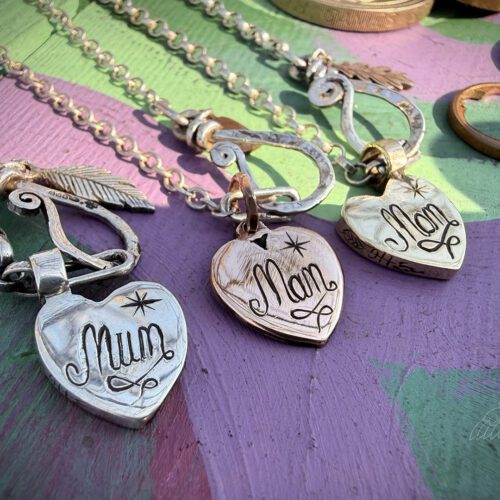 upcycled coin jewelry made from silver bronze and copper coins heart necklace pendant handmade in Cambridge England