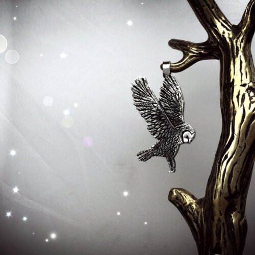handmade and recycled silver coins flying playful owl charm for a tree sculpture, necklace or bracelet
