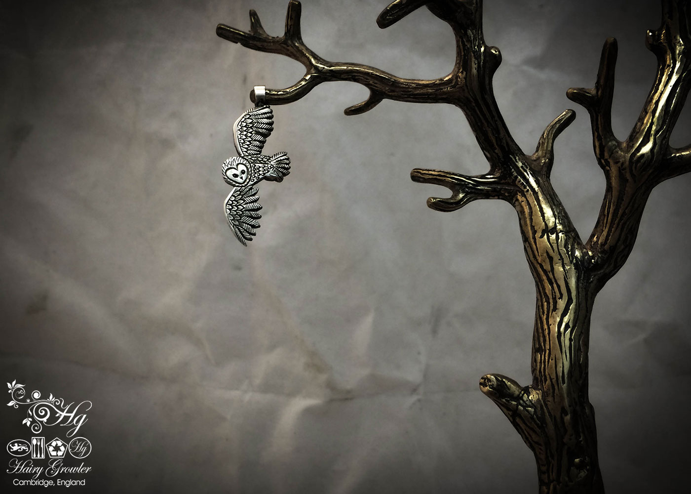 handmade and recycled silver coins flying playful owl charm for a tree sculpture, necklace or bracelet