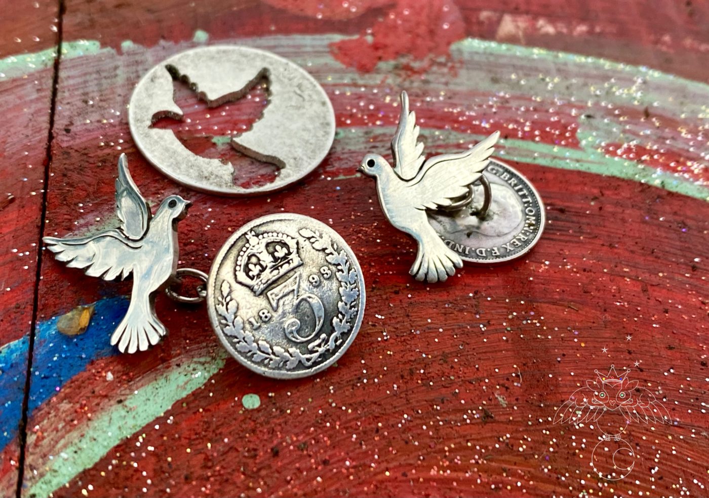 peace dove cufflinks handcrafted and recycled from sterling silver shillings and threepence coins