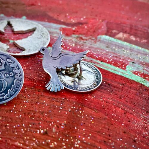 peace dove cufflinks handcrafted and recycled from sterling silver shillings and threepence coins