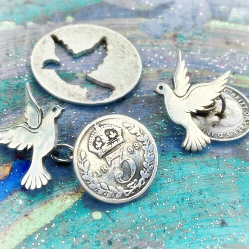 peace dove cufflinks handcrafted and recycled from sterling silver shillings and threepence coins