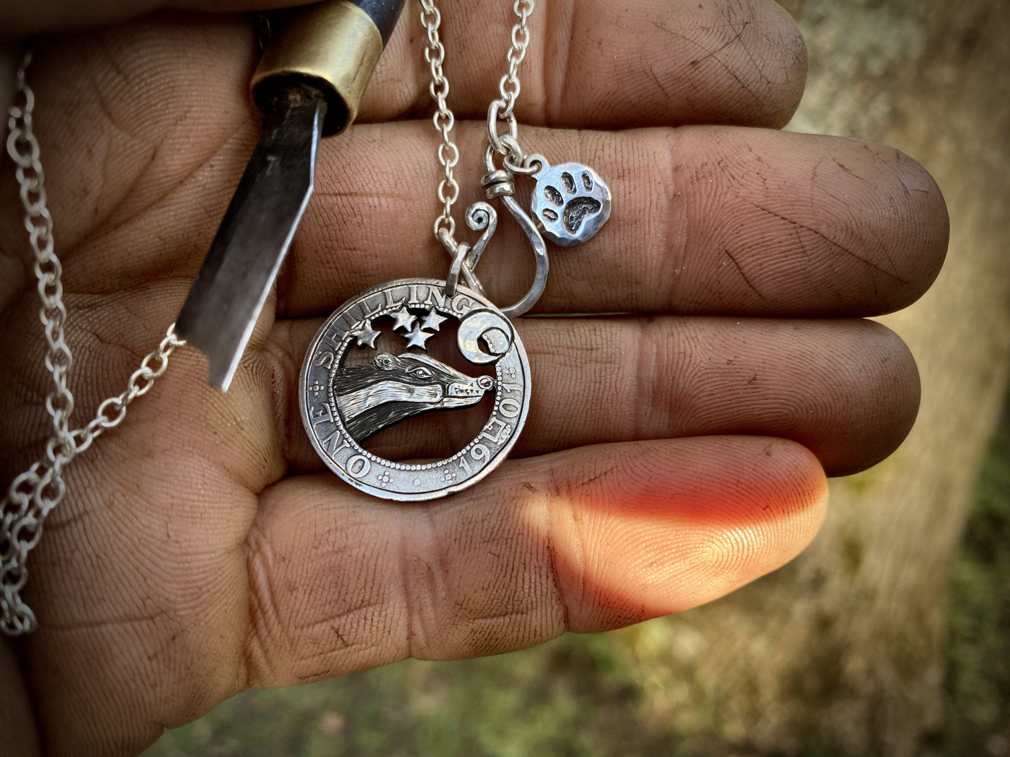 recycled silver shilling badger coin pendant