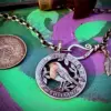 Handmade and completely upcycled and repurposed silver shilling robin red breast necklace pendant