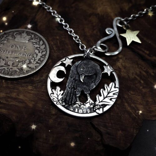 Handmade and repurposed silver shilling curious raven necklace totally handcrafted and recycled from old sterling silver shilling coins. Designed and created by Hairy Growler Jewellery, Cambridge, UK