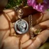 Handmade and upcycled silver shilling coin day-of-the-dead skull necklace