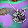 howling wolf silver coin necklace pendant