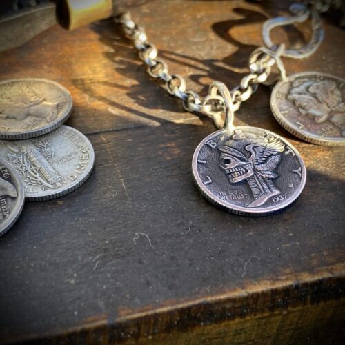 Hand-carved and recycled silver dime liberty coin skull necklace