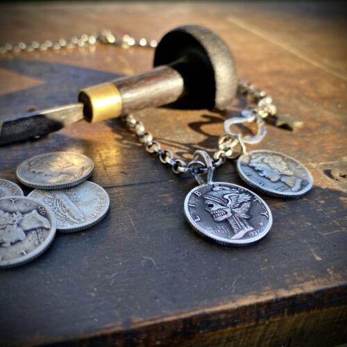 Hand-carved and recycled silver dime liberty coin skull necklace