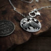 Handmade and upycled silver shilling The Silver Shilling collection. silver kissing owls necklace totally handcrafted and recycled from old sterling silver shilling coins. Designed and created by Hairy Growler Jewellery, Cambridge, UK. necklace