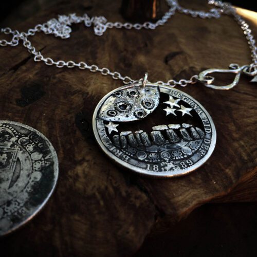 Handcrafted and recycled silver half crown Midnight winter solstice at Stonehenge necklace pendant