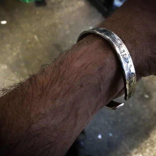Handcrafted and upcycled silver half crown coin kuff bangle bracelet