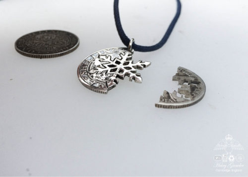 handcrafted and recycled silver shilling snowflake necklace