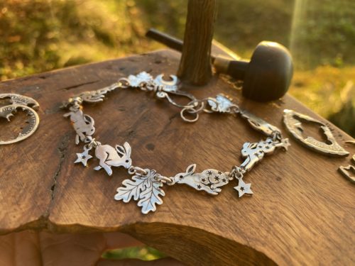 rabbit and hare bracelet individually handmade and recycled from an old Victorian silver coins