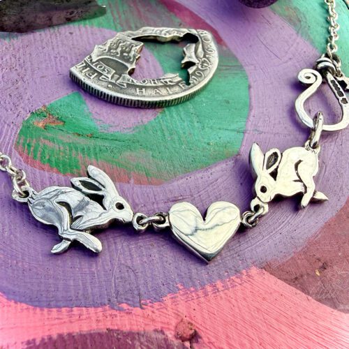 handmade and ethically recycled silver hare love necklace