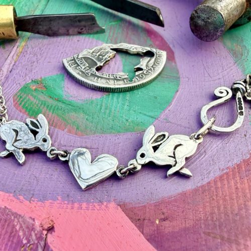 handmade and ethically recycled silver hare love necklace