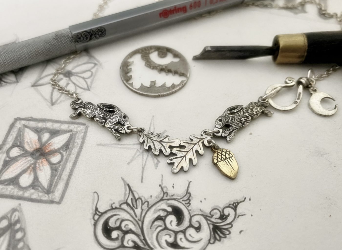 running hares and oak trees. Handcrafted jewellery inspired by nature