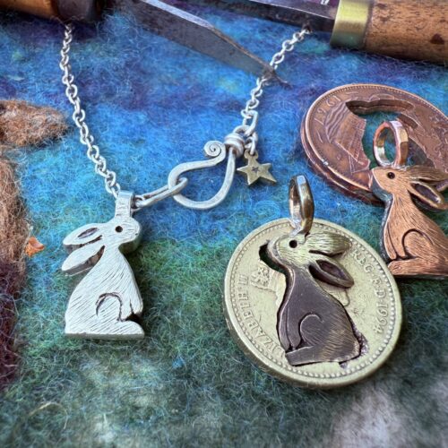 magical moon gazing hare jewellery made in Cambridge England for Glastonbury Festival and Tor using only ethical recycled raw materials such as silver coins and spoons.