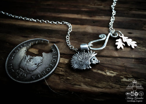 handmade and recycled silver coins hedgehog charm for a tree sculpture, necklace or bracelet