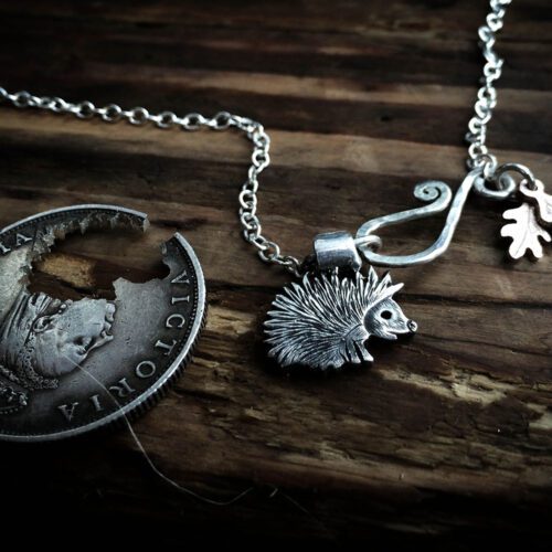 handmade and recycled silver coins hedgehog charm for a tree sculpture, necklace or bracelet