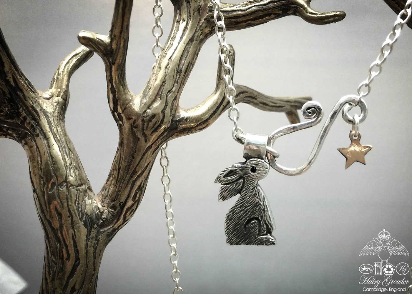 handmade and recycled silver coins moon gazing hare charm for a tree sculpture, necklace or bracelet