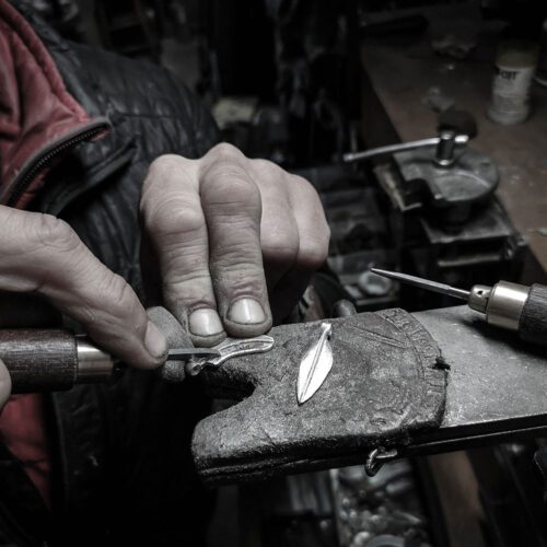 Feather jewellery handcrafted recycled silver coins
