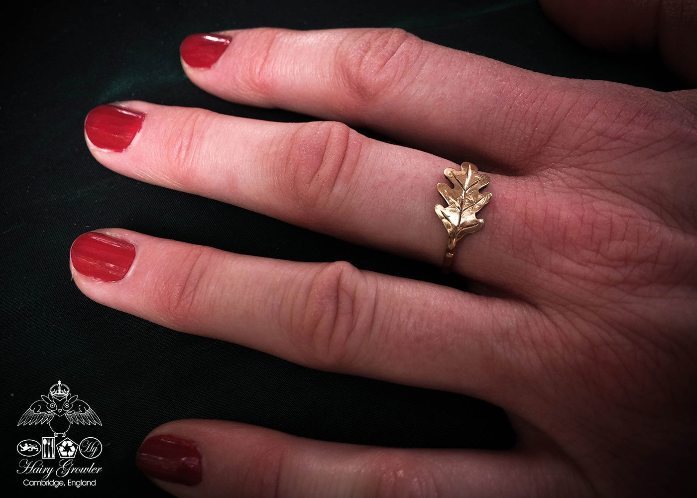 handcrafted and recycled 22ct gold sovereign oak leaf ring. Totally handcrafted and recycled. Unusual and interesting.