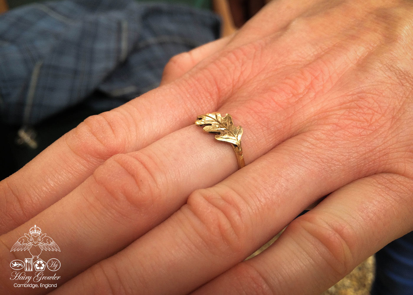 handcrafted and recycled 22ct gold sovereign oak leaf ring. Totally handcrafted and recycled. Unusual and interesting.