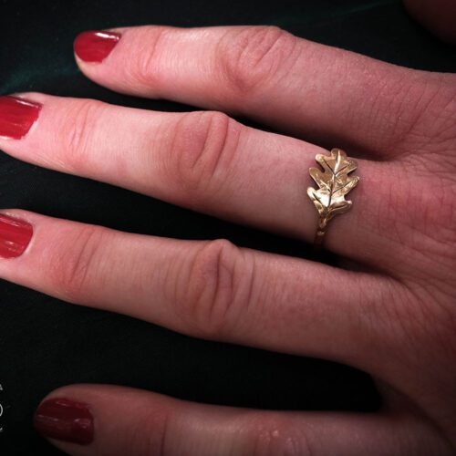 handcrafted and recycled 22ct gold sovereign oak leaf ring. Totally handcrafted and recycled. Unusual and interesting.
