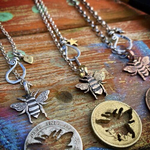 Bee jewellery handmade, handcrafted and completely recycled from old out of circulation coins. Each piece is ethically made in Cambridge England