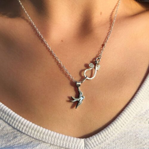 Silver Swallow necklace handmade and recycled ethical jewellery made by independent artisan jeweller. Coin jewellery by Hairy Growler