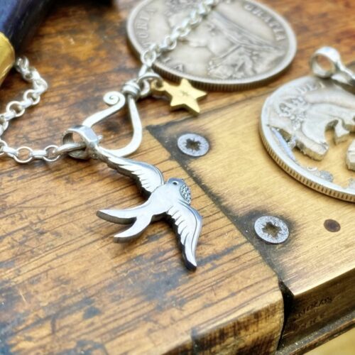 handcrafted silver swallow charm for a tree sculpture, necklace or bracelet