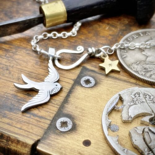 handcrafted silver swallow charm for a tree sculpture, necklace or bracelet