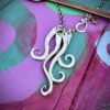 Handcrafted and recycled antique dessert fork necklace