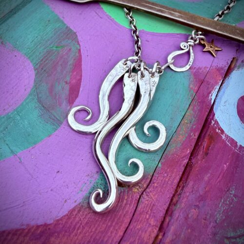 Handcrafted and recycled antique dessert fork necklace