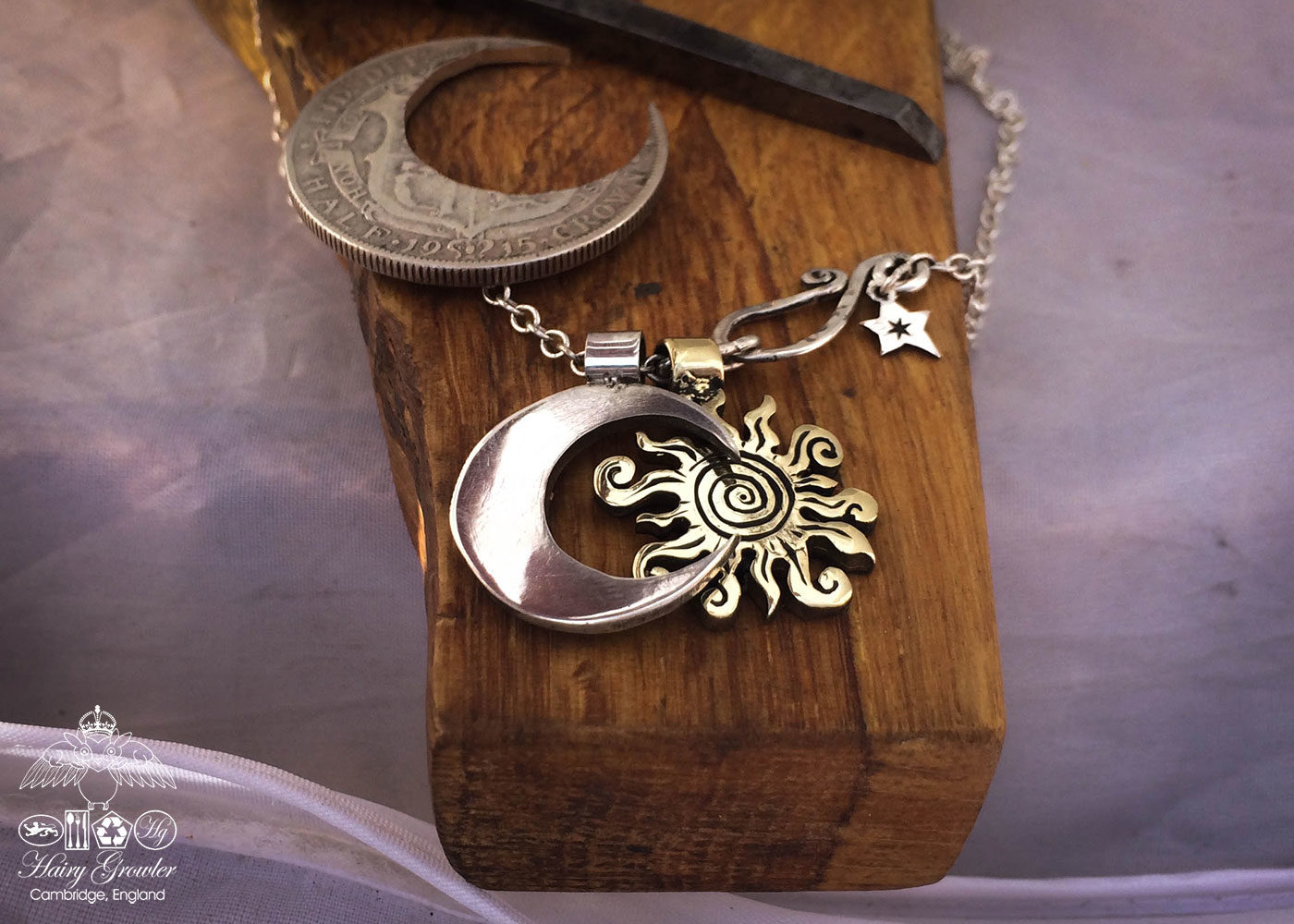 handmade bronze sun charm for a tree sculpture, necklace or bracelet