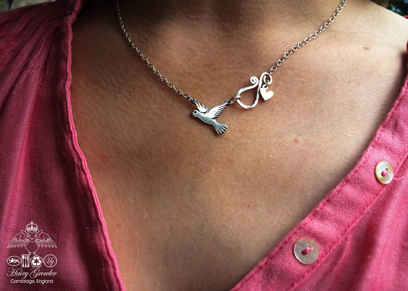 handcrafted and recycled silver coin love, peace and outerness dove necklace
