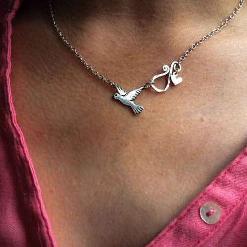 handcrafted and recycled silver coin love, peace and outerness dove necklace