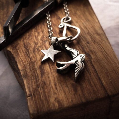 handcrafted silver swallow charm for a tree sculpture, necklace or bracelet