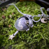 moonlight-leaping hare necklace handcrafted and recycled from three silver shilling coins all over 100 years old